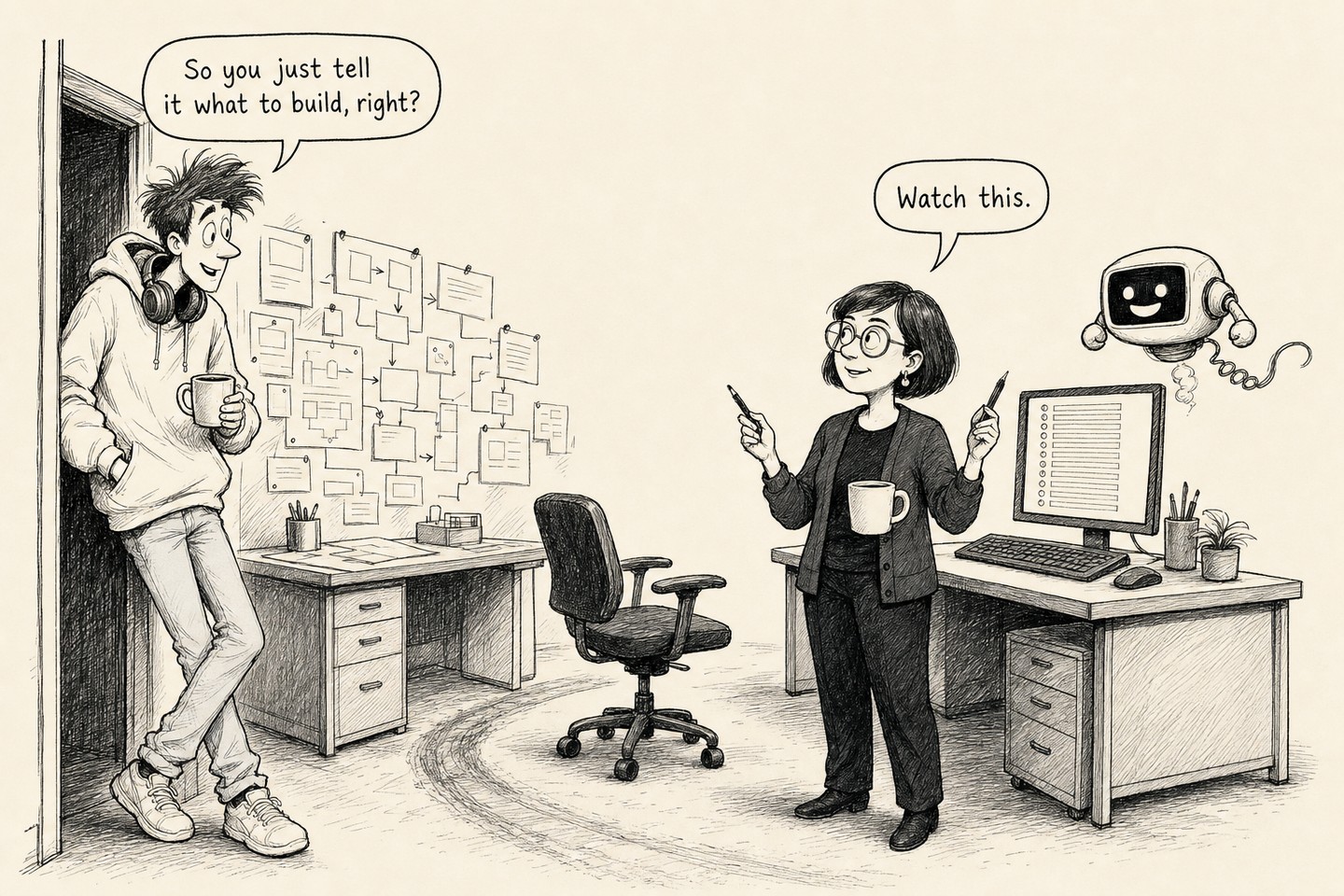The junior leans in the doorway with a mug. The senior stands between her two desks with a pen, turned toward him. The robot hovers over the coding desk behind her. Spoken, in order: So you just tell it what to build, right? Watch this.